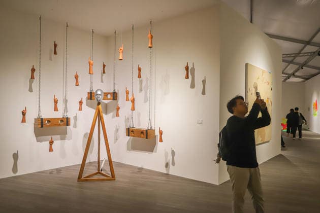 September 20, 2026, Surabaya, East Java, Indonesia: A visitor takes a photo of a contemporary artwork at the ArtSubs 2026 exhibition at Balai Pemuda, Surabaya, East Java, Indonesia, on September 20, 2026. Titled border, threshold, beyond, the art exhibition features 500 works by 113 artists from across Indonesia, serving as a response to the public s need for a space of contemplation, reflection, and entertainment. Surabaya Indonesia - ZUMAp290 20260920_zip_p290_013 Copyright: xRendyxAgungxPrakosox