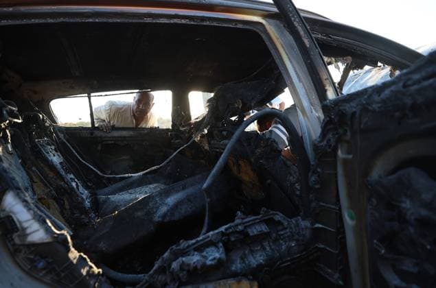 September 20, 2026, Hebron, Palestine, State of: BEIT UMMAR, HEBRON, OCCUPIED WEST BANK, SEPTEMBER 20, 2026: Burned vehicles are seen following an attack by Israeli settlers in the town of Beit Ummar, north of Hebron. According to local sources, a Palestinian woman was injured and five vehicles were set on fire during the attack. Hebron Palestine, State of - ZUMAq101 20260920_zna_q101_077 Copyright: xMosabxShawerx