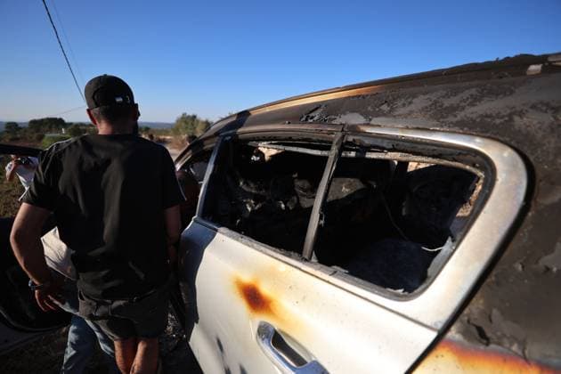 September 20, 2026, Hebron, Palestine, State of: BEIT UMMAR, HEBRON, OCCUPIED WEST BANK, SEPTEMBER 20, 2026: Burned vehicles are seen following an attack by Israeli settlers in the town of Beit Ummar, north of Hebron. According to local sources, a Palestinian woman was injured and five vehicles were set on fire during the attack. Hebron Palestine, State of - ZUMAq101 20260920_zna_q101_081 Copyright: xMosabxShawerx