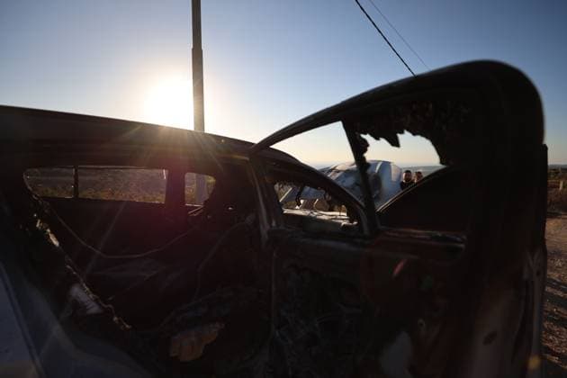 September 20, 2026, Hebron, Palestine, State of: BEIT UMMAR, HEBRON, OCCUPIED WEST BANK, SEPTEMBER 20, 2026: Burned vehicles are seen following an attack by Israeli settlers in the town of Beit Ummar, north of Hebron. According to local sources, a Palestinian woman was injured and five vehicles were set on fire during the attack. Hebron Palestine, State of - ZUMAq101 20260920_zna_q101_086 Copyright: xMosabxShawerx