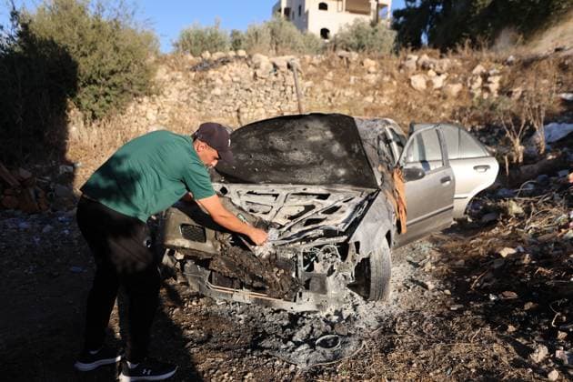 September 20, 2026, Hebron, Palestine, State of: BEIT UMMAR, HEBRON, OCCUPIED WEST BANK, SEPTEMBER 20, 2026: Burned vehicles are seen following an attack by Israeli settlers in the town of Beit Ummar, north of Hebron. According to local sources, a Palestinian woman was injured and five vehicles were set on fire during the attack. Hebron Palestine, State of - ZUMAq101 20260920_zna_q101_088 Copyright: xMosabxShawerx