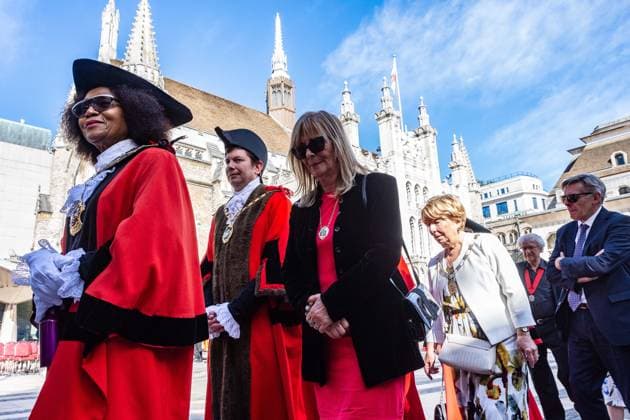 September 20, 2026, London, London, England: Pearly Kings and QueenÃ¢â‚¬â ¢s of London gather with city Mayors, Chelsea pensioner war veterans and dignitaries at Guildhall Yard for the annual Costermongers Harvest Festival celebration. Morris dancers and choirs performed along with the Pearly Kings and Queens who led a sing-a-long of traditional favourite songs such as: Ã¢â‚¬ËœKnees up Mother BrownÃ¢â‚¬â ¢ and Ã¢â‚¬ËœDoing the Lambeth walkÃ¢â‚¬â ¢. A procession followed to the spiritual home of LondonÃ¢â‚¬â ¢s Ã¢â‚¬ËœEastendersÃ¢â‚¬â ¢ at St Mary-le-Bow Church. Tradition has it that anyone born within earshot of the Bow Bells can claim to be a true Cockney. The march was led by a pearly prince carrying a plaited loaf of bread that was prese - ZUMAr169 20260920_zip_r169_009 Copyright: xRodxHarbinsonx