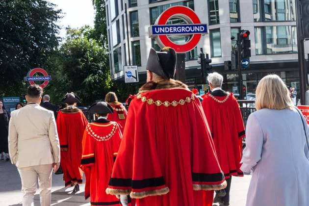 September 20, 2026, London, London, England: Pearly Kings and QueenÃ¢â‚¬â ¢s of London gather with city Mayors, Chelsea pensioner war veterans and dignitaries at Guildhall Yard for the annual Costermongers Harvest Festival celebration. Morris dancers and choirs performed along with the Pearly Kings and Queens who led a sing-a-long of traditional favourite songs such as: Ã¢â‚¬ËœKnees up Mother BrownÃ¢â‚¬â ¢ and Ã¢â‚¬ËœDoing the Lambeth walkÃ¢â‚¬â ¢. A procession followed to the spiritual home of LondonÃ¢â‚¬â ¢s Ã¢â‚¬ËœEastendersÃ¢â‚¬â ¢ at St Mary-le-Bow Church. Tradition has it that anyone born within earshot of the Bow Bells can claim to be a true Cockney. The march was led by a pearly prince carrying a plaited loaf of bread that was prese - ZUMAr169 20260920_zip_r169_016 Copyright: xRodxHarbinsonx