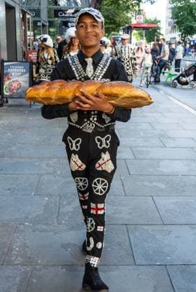 September 20, 2026, London, London, England: Pearly Kings and QueenÃ¢â‚¬â ¢s of London gather with city Mayors, Chelsea pensioner war veterans and dignitaries at Guildhall Yard for the annual Costermongers Harvest Festival celebration. Morris dancers and choirs performed along with the Pearly Kings and Queens who led a sing-a-long of traditional favourite songs such as: Ã¢â‚¬ËœKnees up Mother BrownÃ¢â‚¬â ¢ and Ã¢â‚¬ËœDoing the Lambeth walkÃ¢â‚¬â ¢. A procession followed to the spiritual home of LondonÃ¢â‚¬â ¢s Ã¢â‚¬ËœEastendersÃ¢â‚¬â ¢ at St Mary-le-Bow Church. Tradition has it that anyone born within earshot of the Bow Bells can claim to be a true Cockney. The march was led by a pearly prince carrying a plaited loaf of bread that was prese - ZUMAr169 20260920_zip_r169_017 Copyright: xRodxHarbinsonx