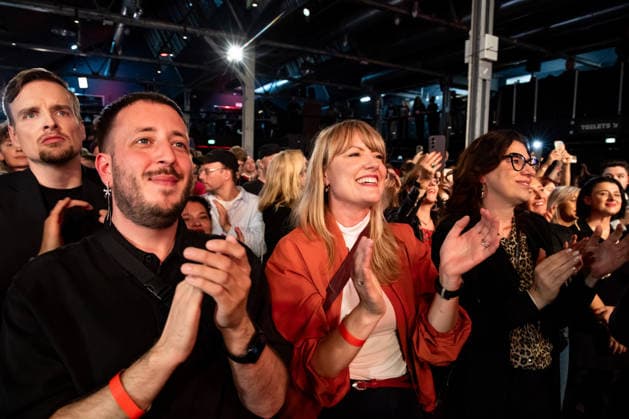 Party members celebrate as the first election projections for the Berlin House of Representatives are announced at The Left’s election party at the Festsaal Kreuzberg in Berlin on September 20, 2026. According to ARD’s initial projections, the party is expected to win with 24.5 percent of the vote. The Left wins the Berlin House of Representatives election