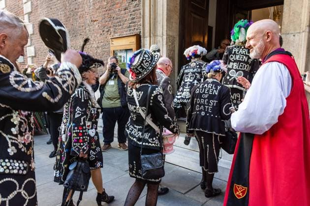 September 20, 2026, London, London, England: Pearly Kings and QueenÃ¢â‚¬â ¢s of London gather with city Mayors, Chelsea pensioner war veterans and dignitaries at Guildhall Yard for the annual Costermongers Harvest Festival celebration. Morris dancers and choirs performed along with the Pearly Kings and Queens who led a sing-a-long of traditional favourite songs such as: Ã¢â‚¬ËœKnees up Mother BrownÃ¢â‚¬â ¢ and Ã¢â‚¬ËœDoing the Lambeth walkÃ¢â‚¬â ¢. A procession followed to the spiritual home of LondonÃ¢â‚¬â ¢s Ã¢â‚¬ËœEastendersÃ¢â‚¬â ¢ at St Mary-le-Bow Church. Tradition has it that anyone born within earshot of the Bow Bells can claim to be a true Cockney. The march was led by a pearly prince carrying a plaited loaf of bread that was prese - ZUMAr169 20260920_zip_r169_043 Copyright: xRodxHarbinsonx