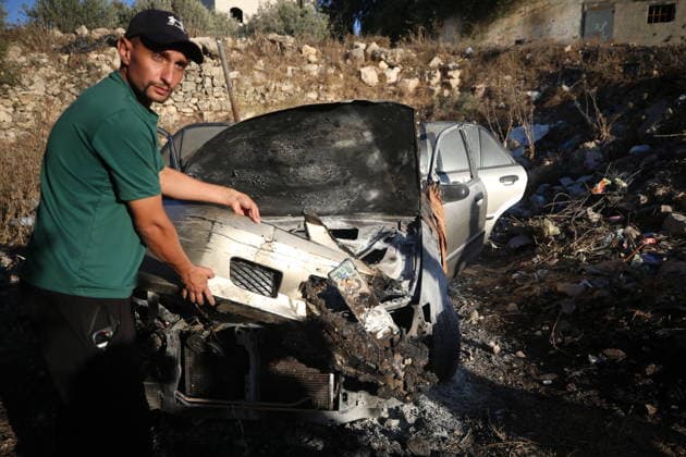 Palestinians inspect cars set on fire by Israeli settlers in Hebron HEBRON, WEST BANK, PALESTINE - SEPTEMBER 20: Palestinians inspect burned cars that were set on fire during a raid conducted by Israeli settlers in Beit Ummar town, north of Hebron, West Bank, Palestine on September 20, 2026. A group of Israeli settlers raided the town, setting fire to several Palestinian-owned vehicles and property, causing extensive damage. Wisam Hashlamoun Anadolu Hebron West Bank. Editorial use only. Please get in touch for any other usage.  Copyright: x2026xAnadoluxWisamxHashlamounx