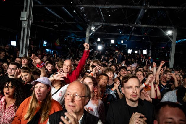 Party members celebrate as the first election projections for the Berlin House of Representatives are announced at The Left’s election party at the Festsaal Kreuzberg in Berlin on September 20, 2026. According to ARD’s initial projections, the party is projected to win 24,5 percent of the vote. The Left wins the Berlin House of Representatives election