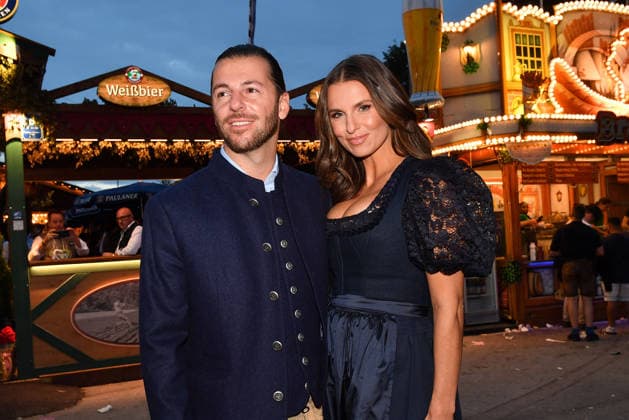 Riccardo Basile and Laura Wontorra during the 2026 Oktoberfest in front of the Almauftrieb at Theresienwiese on September 20, 2026, in Munich, Germany; Oktoberfest: the Almauftrieb at Theresienwiese in Munich, Germany