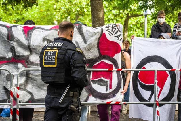 September 20, 2026, Munich, Bavaria, Germany: Coinciding with Oktoberfest, a group of right-extremists from the Identitaere Bewegung held a rally under the Banner of the Save Europe Act which includes, according to them, guidelines for the so-called Remigration. Some members discussed Remigration to include non-native born Germans, as they feel they can never be German, even if they hit all integration points. Critics in Germany see it as eyebrow-raising that the Identitaere leader, Martin Sellner, is an Austrian that is essentially making German policy and can play a greater role in government should the AfD take power. Munich Germany - ZUMAb160 20260920_abp_b160_006 Copyright: xSachellexBabbarx