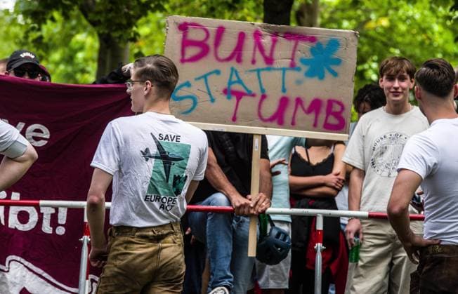 September 20, 2026, Munich, Bavaria, Germany: Coinciding with Oktoberfest, a group of right-extremists from the Identitaere Bewegung held a rally under the Banner of the Save Europe Act which includes, according to them, guidelines for the so-called Remigration. Some members discussed Remigration to include non-native born Germans, as they feel they can never be German, even if they hit all integration points. Critics in Germany see it as eyebrow-raising that the Identitaere leader, Martin Sellner, is an Austrian that is essentially making German policy and can play a greater role in government should the AfD take power. Munich Germany - ZUMAb160 20260920_abp_b160_024 Copyright: xSachellexBabbarx