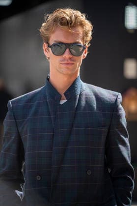 September 20, 2026, London, Camden, United Kingdom: An attendee arrives wearing a Tartan suit and dark glasses at the Erdem catwalk show, held at the Roundhouse in Camden, London, as part of London Fashion Week 2026. Models and members of the fashion industry gather at the Roundhouse in Camden, London, for the Erdem catwalk show during London Fashion Week 2026. The event forms part of the official London Fashion Week schedule, bringing together models, designers, fashion professionals, media and guests for the presentation of Erdem s latest collection. London United Kingdom - ZUMAs197 20260920_aaa_s197_341 Copyright: xJamesxWilloughbyx