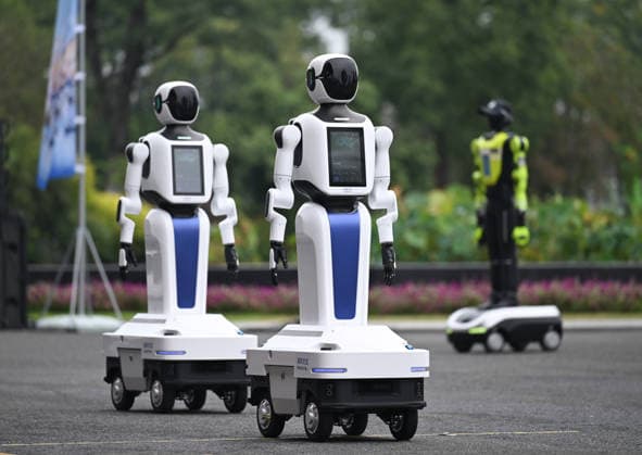 HANGZHOU, CHINA - SEPTEMBER 20: Two service robots enter the venue to display their skills during the first Intelligent Robot Application Skills Exhibition Zhejiang Station on September 20, 2026 in Hangzhou, Zhejiang Province of China. The Zhejiang leg of the first Intelligent Robot Application Skills Exhibition, hosted by China Media Group (CMG), kicked off in Hangzhou, east China s Zhejiang Province, on Sunday.  Copyright: xChinaxNewsxServicex 111668235911