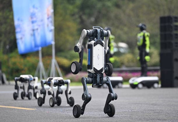 HANGZHOU, CHINA - SEPTEMBER 20: A Unitree quadruped robot enters the venue to demonstrate skills during the first Intelligent Robot Application Skills Grand Exhibition Zhejiang Station on September 20, 2026 in Hangzhou, Zhejiang Province of China. The Zhejiang leg of the first Intelligent Robot Application Skills Exhibition, hosted by China Media Group (CMG), kicked off in Hangzhou, east China s Zhejiang Province, on Sunday.  Copyright: xChinaxNewsxServicex 111668235692