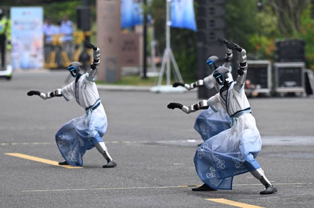 HANGZHOU, CHINA - SEPTEMBER 20: A humanoid robot performs martial arts during the first smart robot application skills exhibition on September 20, 2026 in Hangzhou, Zhejiang Province of China. The Zhejiang leg of the first Intelligent Robot Application Skills Exhibition, hosted by China Media Group (CMG), kicked off in Hangzhou, east China s Zhejiang Province, on Sunday.  Copyright: xChinaxNewsxServicex 111668235324