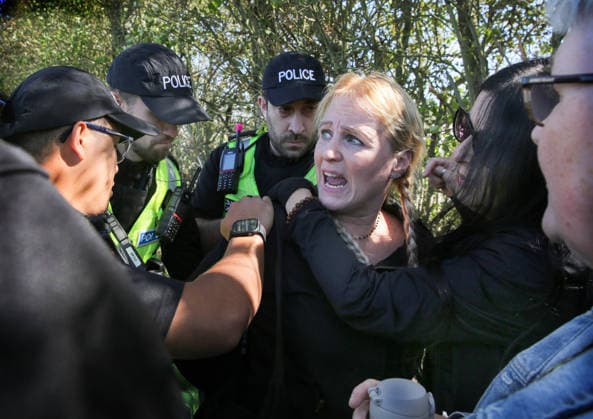 September 20, 2026, Huntingdon, United Kingdom: An activist is arrested after police accuse her of breaking bail conditions at MBR Acres. Animal activists protest outside MBR Acres at Camp Beagle to Commemorate 50 years of The Animal Liberation Front (ALF). They gathered outside puppy breeding facility, MBR Acres that breed dogs for the vivisection industry. The protest Camp Beagle has had a permanent presence outside MBR Acres for five years. They say are staying until MBR Acres shuts down and the puppies are re-homed. Huntingdon United Kingdom - ZUMAs197 20260920_aaa_s197_417 Copyright: xMartinxPopex