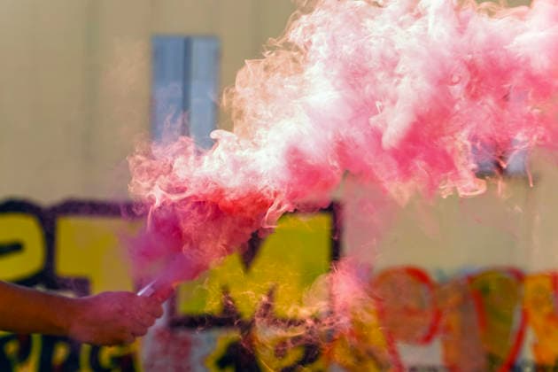A pink smoke bomb is thrown during a demonstra Copyright: xAchimxDuwentästerx