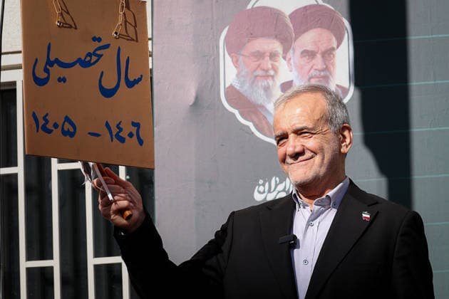 September 21, 2026, Tehran, Iran: Iranian President Masoud Pezeshkian holds the school bell marker during the Jashn-e Shokoufeha ceremony at Fatemeh Zahra Girls Primary School in Tehran, Iran, on September 21, 2026. The ceremony, known as Jashn-e Shokoufeha, or the Festival of Blossoms, marks the start of school for first-grade pupils across Iran. Iranian state media said about 1.154 million first-grade students were beginning school nationwide this year. Tehran Iran - ZUMAi98_ 20260921_zih_i98_012 Copyright: xIranianxPresidencyx