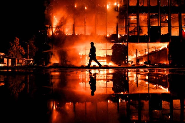 Rescuers extinguish a fire at the Intrade shopping centre, which broke out following a Russian drone attack during the night, Zaporizhzhia, Ukraine, September 21, 2026. On Monday night, Russian forces struck the southeastern city with strike UAVs and an FPV drone. The attack destroyed the shopping centre and damaged a university building as well as multi-storey residential blocks. Six people were injured. (Photo by Dmytro Smolienko Ukrinform) Russian army attacks shopping mall with drones in Zaporizhzhia  Copyright: xDmytroxSmolienkox
