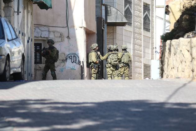 Israeli Forces Started Large-Scale Military Operation In Biddu BIDU, PALESTINE SEPTEMBER 21, 2026: Israeli forces continued a large-scale military operation in the town of Biddu, northwest of occupied Jerusalem, with raids on homes, searches, arrests and field interrogations. The operation began at around 1:00 AM, according to local sources. Israeli forces raided the home of a Palestinian man accused of carrying out the Nabi Saleh attack, taking measurements and digging into parts of the walls in preparation for a possible demolition or explosion, according to local reports. His family home was also raided, and his father and other family members were detained. Israeli forces also seized a house belonging to a resident and converted it Copyright: x xSalmanxMohsenxAlkhatibx xJNAxPressx