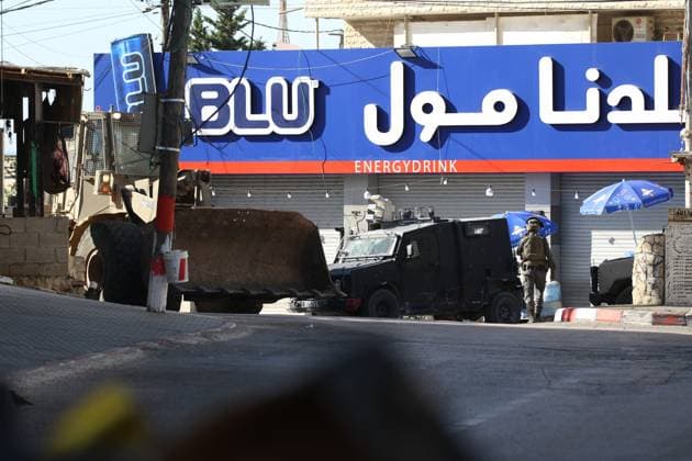 Israeli Forces Started Large-Scale Military Operation In Biddu BIDU, PALESTINE SEPTEMBER 21, 2026: Israeli forces continued a large-scale military operation in the town of Biddu, northwest of occupied Jerusalem, with raids on homes, searches, arrests and field interrogations. The operation began at around 1:00 AM, according to local sources. Israeli forces raided the home of a Palestinian man accused of carrying out the Nabi Saleh attack, taking measurements and digging into parts of the walls in preparation for a possible demolition or explosion, according to local reports. His family home was also raided, and his father and other family members were detained. Israeli forces also seized a house belonging to a resident and converted it Copyright: x xSalmanxMohsenxAlkhatibx xJNAxPressx