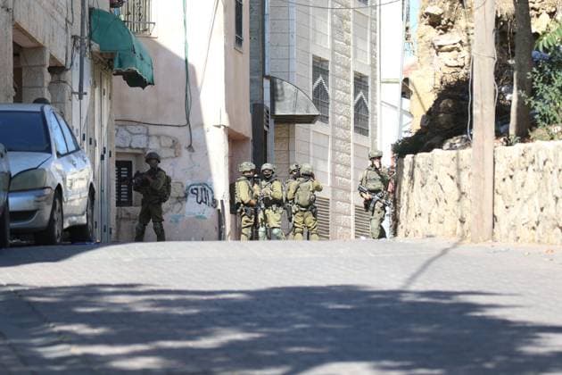 Israeli Forces Started Large-Scale Military Operation In Biddu BIDU, PALESTINE SEPTEMBER 21, 2026: Israeli forces continued a large-scale military operation in the town of Biddu, northwest of occupied Jerusalem, with raids on homes, searches, arrests and field interrogations. The operation began at around 1:00 AM, according to local sources. Israeli forces raided the home of a Palestinian man accused of carrying out the Nabi Saleh attack, taking measurements and digging into parts of the walls in preparation for a possible demolition or explosion, according to local reports. His family home was also raided, and his father and other family members were detained. Israeli forces also seized a house belonging to a resident and converted it Copyright: x xSalmanxMohsenxAlkhatibx xJNAxPressx