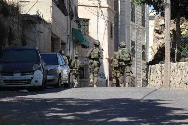 Israeli Forces Started Large-Scale Military Operation In Biddu BIDU, PALESTINE SEPTEMBER 21, 2026: Israeli forces continued a large-scale military operation in the town of Biddu, northwest of occupied Jerusalem, with raids on homes, searches, arrests and field interrogations. The operation began at around 1:00 AM, according to local sources. Israeli forces raided the home of a Palestinian man accused of carrying out the Nabi Saleh attack, taking measurements and digging into parts of the walls in preparation for a possible demolition or explosion, according to local reports. His family home was also raided, and his father and other family members were detained. Israeli forces also seized a house belonging to a resident and converted it Copyright: x xSalmanxMohsenxAlkhatibx xJNAxPressx