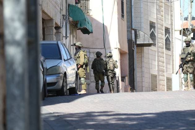 Israeli Forces Started Large-Scale Military Operation In Biddu BIDU, PALESTINE SEPTEMBER 21, 2026: Israeli forces continued a large-scale military operation in the town of Biddu, northwest of occupied Jerusalem, with raids on homes, searches, arrests and field interrogations. The operation began at around 1:00 AM, according to local sources. Israeli forces raided the home of a Palestinian man accused of carrying out the Nabi Saleh attack, taking measurements and digging into parts of the walls in preparation for a possible demolition or explosion, according to local reports. His family home was also raided, and his father and other family members were detained. Israeli forces also seized a house belonging to a resident and converted it Copyright: x xSalmanxMohsenxAlkhatibx xJNAxPressx