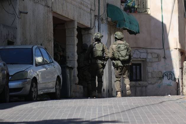Israeli Forces Started Large-Scale Military Operation In Biddu BIDU, PALESTINE SEPTEMBER 21, 2026: Israeli forces continued a large-scale military operation in the town of Biddu, northwest of occupied Jerusalem, with raids on homes, searches, arrests and field interrogations. The operation began at around 1:00 AM, according to local sources. Israeli forces raided the home of a Palestinian man accused of carrying out the Nabi Saleh attack, taking measurements and digging into parts of the walls in preparation for a possible demolition or explosion, according to local reports. His family home was also raided, and his father and other family members were detained. Israeli forces also seized a house belonging to a resident and converted it Copyright: x xSalmanxMohsenxAlkhatibx xJNAxPressx