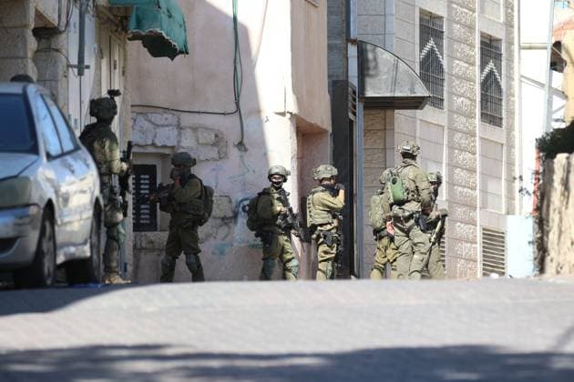 Israeli Forces Started Large-Scale Military Operation In Biddu BIDU, PALESTINE SEPTEMBER 21, 2026: Israeli forces continued a large-scale military operation in the town of Biddu, northwest of occupied Jerusalem, with raids on homes, searches, arrests and field interrogations. The operation began at around 1:00 AM, according to local sources. Israeli forces raided the home of a Palestinian man accused of carrying out the Nabi Saleh attack, taking measurements and digging into parts of the walls in preparation for a possible demolition or explosion, according to local reports. His family home was also raided, and his father and other family members were detained. Israeli forces also seized a house belonging to a resident and converted it Copyright: x xSalmanxMohsenxAlkhatibx xJNAxPressx
