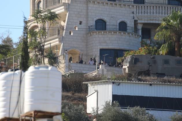 Israeli Forces Started Large-Scale Military Operation In Biddu BIDU, PALESTINE SEPTEMBER 21, 2026: Israeli forces continued a large-scale military operation in the town of Biddu, northwest of occupied Jerusalem, with raids on homes, searches, arrests and field interrogations. The operation began at around 1:00 AM, according to local sources. Israeli forces raided the home of a Palestinian man accused of carrying out the Nabi Saleh attack, taking measurements and digging into parts of the walls in preparation for a possible demolition or explosion, according to local reports. His family home was also raided, and his father and other family members were detained. Israeli forces also seized a house belonging to a resident and converted it Copyright: x xSalmanxMohsenxAlkhatibx xJNAxPressx