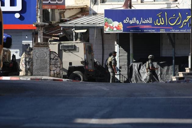Israeli Forces Started Large-Scale Military Operation In Biddu BIDU, PALESTINE SEPTEMBER 21, 2026: Israeli forces continued a large-scale military operation in the town of Biddu, northwest of occupied Jerusalem, with raids on homes, searches, arrests and field interrogations. The operation began at around 1:00 AM, according to local sources. Israeli forces raided the home of a Palestinian man accused of carrying out the Nabi Saleh attack, taking measurements and digging into parts of the walls in preparation for a possible demolition or explosion, according to local reports. His family home was also raided, and his father and other family members were detained. Israeli forces also seized a house belonging to a resident and converted it Copyright: x xSalmanxMohsenxAlkhatibx xJNAxPressx