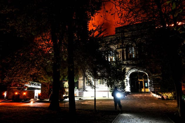 Historic building of Zaporizhzhia National University struck by Russian army A firefighter holds a torchlight during a response to a fire caused by an overnight Russian drone attack in Academic Building No. 3 of Zaporizhzhia National University in the Oleksandrivskyi district of Zaporizhzhia, Ukraine, September 21, 2026. The building, a cultural heritage site and architectural monument of local significance, was formerly the Oleksandrivsk Girls™ Gymnasium, built in 1902. A significant portion of the historic structure burned down in the attack. Buildings No. 4 and No. 5 also sustained damage, with windows shattered. The Russian strike additionally destroyed a shopping centre and damaged multi-storey residential blocks. Six people were inj  Copyright: xDmytroxSmolienkox xUkrinformx xAvalonx 1137024812