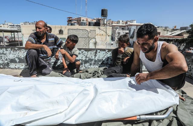 2 killed and 11 injured as Israeli strikes hit encampments in southern Gaza KHAN YUNIS, GAZA, PALESTINE - SEPTEMBER 21: (EDITOR S NOTE: Image depicts death) Relatives mourn during the funeral for Palestinian child Ismail Bardawil outside Nasser Hospital in Khan Yunis, Gaza, Palestine on September 21, 2026. Bardawil was killed after Israeli forces opened fire on encampments housing displaced families in the Al-Mawasi area near Rafah. Medical officials reported that early morning Israeli attacks targeting civilians and tent shelters across the enclave left two people dead, a woman and a child, and 11 others wounded, raising further concerns over ongoing ceasefire breaches. Abed Rahim Khatib Anadolu Khan Yunis Gaza. Editorial use only. Pleas  Copyright: x2026xAnadoluxAbedxRahimxKhatibx