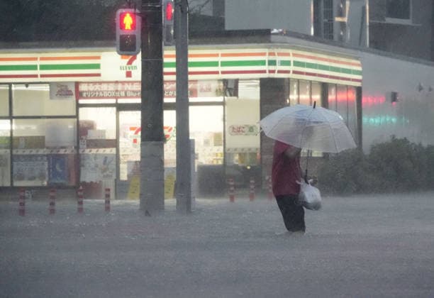 Typhoon in eastern Japan A street in Ichikawa near Tokyo is flooded on Sept. 21, 2026, due to Typhoon Dujuan.  A14AA0005628194P