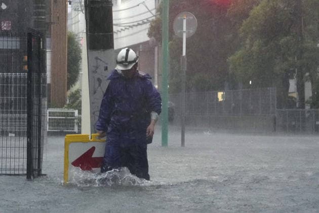 Typhoon in eastern Japan A street in Ichikawa near Tokyo is flooded on Sept. 21, 2026, due to Typhoon Dujuan.  A14AA0005628195P