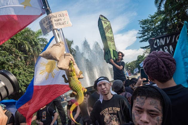 September 21, 2026, Quezon City, Quezon, Philippines: Thousands of Filipinos and various progressive groups from multiple sectors protested through the streets of Manila until Recto Ave, commemorating 54 years since the decalaration of Martial Law by late President Marcos Sr, father of current president Marcos Jr. The protesters were stopped at by the Philippine National Police s barricades. Quezon City Philippines - ZUMAy102 20260921_zip_y102_005 Copyright: xKenosisxYapx
