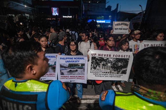 September 21, 2026, Quezon City, Quezon, Philippines: Thousands of Filipinos and various progressive groups from multiple sectors protested through the streets of Manila until Recto Ave, commemorating 54 years since the decalaration of Martial Law by late President Marcos Sr, father of current president Marcos Jr. The protesters were stopped at by the Philippine National Police s barricades. Quezon City Philippines - ZUMAy102 20260921_zip_y102_015 Copyright: xKenosisxYapx