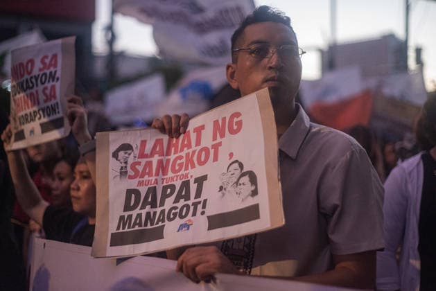 September 21, 2026, Quezon City, Quezon, Philippines: Thousands of Filipinos and various progressive groups from multiple sectors protested through the streets of Manila until Recto Ave, commemorating 54 years since the decalaration of Martial Law by late President Marcos Sr, father of current president Marcos Jr. The protesters were stopped at by the Philippine National Police s barricades. Quezon City Philippines - ZUMAy102 20260921_zip_y102_018 Copyright: xKenosisxYapx