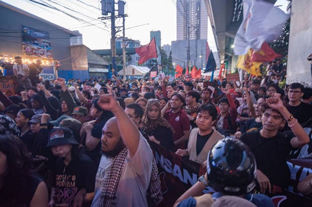 September 21, 2026, Quezon City, Quezon, Philippines: Thousands of Filipinos and various progressive groups from multiple sectors protested through the streets of Manila until Recto Ave, commemorating 54 years since the decalaration of Martial Law by late President Marcos Sr, father of current president Marcos Jr. The protesters were stopped at by the Philippine National Police s barricades. Quezon City Philippines - ZUMAy102 20260921_zip_y102_019 Copyright: xKenosisxYapx