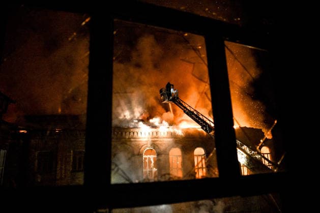 Historic Building of Zaporizhzhia National University Struck by Russian Army - Ukraine A rescuer uses an aerial work platform to extinguish a fire at Academic Building No. 3 of Zaporizhzhia National University, caused by an overnight Russian drone attack in the Oleksandrivskyi district of Zaporizhzhia, Ukraine, September 21, 2026. The building, a cultural heritage site and architectural monument of local significance, was formerly the Oleksandrivsk Girls? Gymnasium, built in 1902. A significant portion of the historic structure burned down in the attack. Buildings No. 4 and No. 5 also sustained damage, with windows shattered. The Russian strike additionally destroyed a shopping centre and damaged multi-storey residential blocks. Six people  Copyright: xSmoliyenkoxDmytro Ukrinform ABACAx