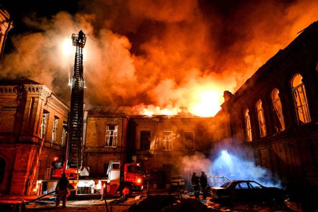 Historic Building of Zaporizhzhia National University Struck by Russian Army - Ukraine A rescuer uses an aerial work platform to extinguish a fire at Academic Building No. 3 of Zaporizhzhia National University, caused by an overnight Russian drone attack in the Oleksandrivskyi district of Zaporizhzhia, Ukraine, September 21, 2026. The building, a cultural heritage site and architectural monument of local significance, was formerly the Oleksandrivsk Girls? Gymnasium, built in 1902. A significant portion of the historic structure burned down in the attack. Buildings No. 4 and No. 5 also sustained damage, with windows shattered. The Russian strike additionally destroyed a shopping centre and damaged multi-storey residential blocks. Six people  Copyright: xSmoliyenkoxDmytro Ukrinform ABACAx