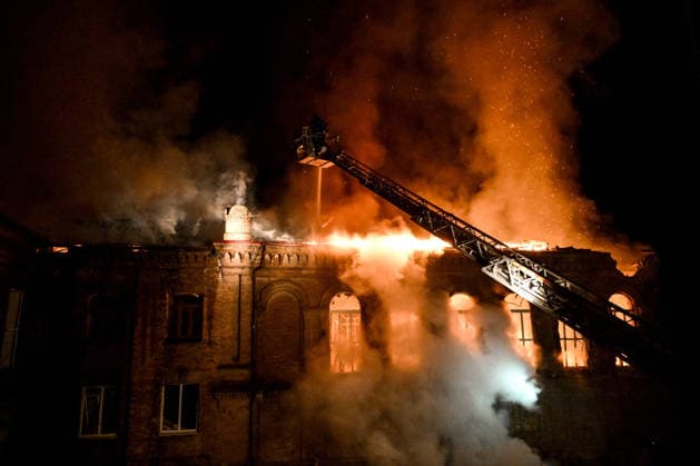 Historic Building of Zaporizhzhia National University Struck by Russian Army - Ukraine A rescuer uses an aerial work platform to extinguish a fire at Academic Building No. 3 of Zaporizhzhia National University, caused by an overnight Russian drone attack in the Oleksandrivskyi district of Zaporizhzhia, Ukraine, September 21, 2026. The building, a cultural heritage site and architectural monument of local significance, was formerly the Oleksandrivsk Girls? Gymnasium, built in 1902. A significant portion of the historic structure burned down in the attack. Buildings No. 4 and No. 5 also sustained damage, with windows shattered. The Russian strike additionally destroyed a shopping centre and damaged multi-storey residential blocks. Six people  Copyright: xSmoliyenkoxDmytro Ukrinform ABACAx