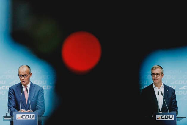 L R Friedrich Merz, CDU, Chancellor, and Stefan Evers, CDU’s top candidate for the Berlin House of Representatives election, photographed during a press conference in response to the state election in Mecklenbur Copyright: xFlorianxGaertnerx