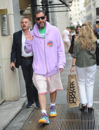RECORD DATE NOT STATED IPA88808747 - Milan, photo by Mimmo Carriero—After stopping by Bacaro, a restaurant on Via Montenapoleone, Adam Sandler strolls through the streets of downtown. He is recognized immediately, and people ask him for photos and autographs, which he grants without hesitation. His wife Jackie follows him at a distance so as not to be recognized or photographed, and after entering the hotel—thinking no one is watching—they let themselves go, kissing and embracing before heading up to their room.  Copyright: xx xx IPA88808747