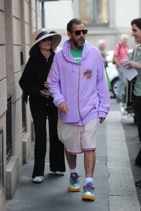 RECORD DATE NOT STATED IPA88808772 - Milan, photo by Mimmo Carriero—After stopping by Bacaro, a restaurant on Via Montenapoleone, Adam Sandler strolls through the streets of downtown. He is recognized immediately, and people ask him for photos and autographs, which he grants without hesitation. His wife Jackie follows him at a distance so as not to be recognized or photographed, and after entering the hotel—thinking no one is watching—they let themselves go, kissing and embracing before heading up to their room.  Copyright: xx xx IPA88808772