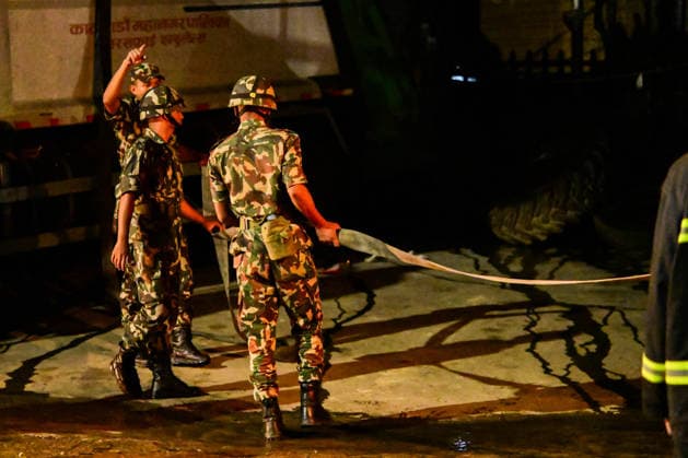 Nepal: Fire Breaks Out At Plastic Warehouse In Kathmandu Security personnel from the Nepal Army, Armed Police Force (APF) and Nepal Police, along with firefighters from Kathmandu Metropolitan City, work to extinguish a fire at a plastic warehouse near residential houses and the waste-management centre in Teku, Kathmandu, Nepal, on September 21, 2026. The fire broke out at a plastic warehouse in Kathmandu Metropolitan City-12, with firefighters, security personnel and local residents working to control the blaze. The cause of the fire and the extent of the damage were not immediately known. Kathmandu Bagmati Nepal  Copyright: xSafalxPrakashxShresthax originalFilename: shrestha-nepalfir260921_npXab.jpg