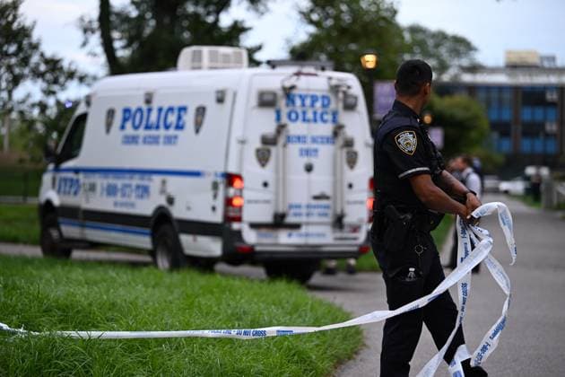 September 21, 2026, Far Rockaway, Queens, New York, USA: NYPD officers work the scene where a 14-year-old boy was shot at 430 Beach 54 Street in Far Rockaway, Queens, New York, United States on Monday, September 21, 2026. The shooting happened after 3:30 pm and the victim was transported to LI Jewish Hospital Cohen and was originally listed in critical condition. A scooter and shell casings were found at the scene. There are no arrests and the investigation is ongoing by the NYPD. Far Rockaway, Queens USA - ZUMAs197 20260921_aaa_s197_088 Copyright: xKylexMazzax