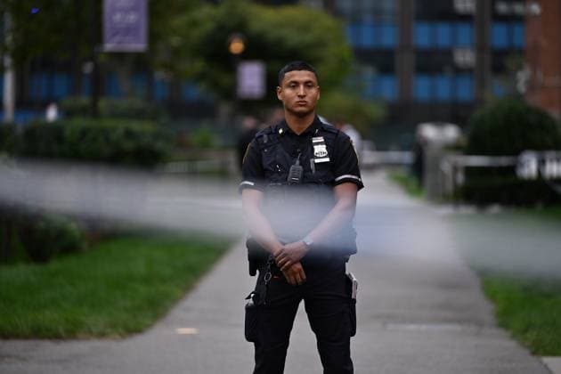 September 21, 2026, Far Rockaway, Queens, New York, USA: NYPD officers work the scene where a 14-year-old boy was shot at 430 Beach 54 Street in Far Rockaway, Queens, New York, United States on Monday, September 21, 2026. The shooting happened after 3:30 pm and the victim was transported to LI Jewish Hospital Cohen and was originally listed in critical condition. A scooter and shell casings were found at the scene. There are no arrests and the investigation is ongoing by the NYPD. Far Rockaway, Queens USA - ZUMAs197 20260921_aaa_s197_093 Copyright: xKylexMazzax