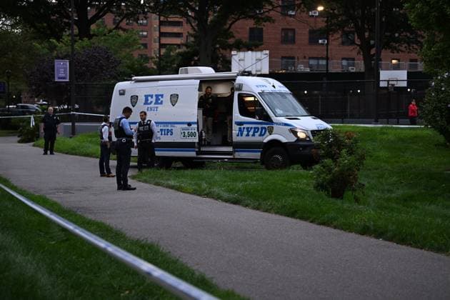 September 21, 2026, Far Rockaway, Queens, New York, USA: NYPD officers work the scene where a 14-year-old boy was shot at 430 Beach 54 Street in Far Rockaway, Queens, New York, United States on Monday, September 21, 2026. The shooting happened after 3:30 pm and the victim was transported to LI Jewish Hospital Cohen and was originally listed in critical condition. A scooter and shell casings were found at the scene. There are no arrests and the investigation is ongoing by the NYPD. Far Rockaway, Queens USA - ZUMAs197 20260921_aaa_s197_095 Copyright: xKylexMazzax